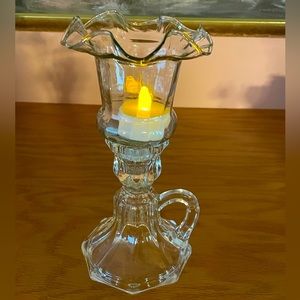 Victorian peg ruffle votive holder with a base.